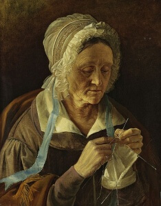 old woman knitting socks