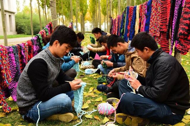 Students Knit 500 Scarves for City Workers