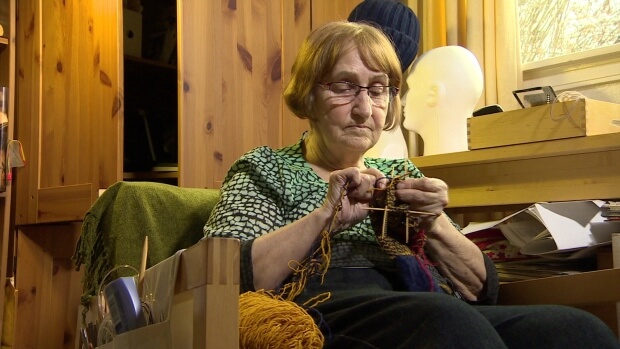 Senior losing housing subsidy over knitting